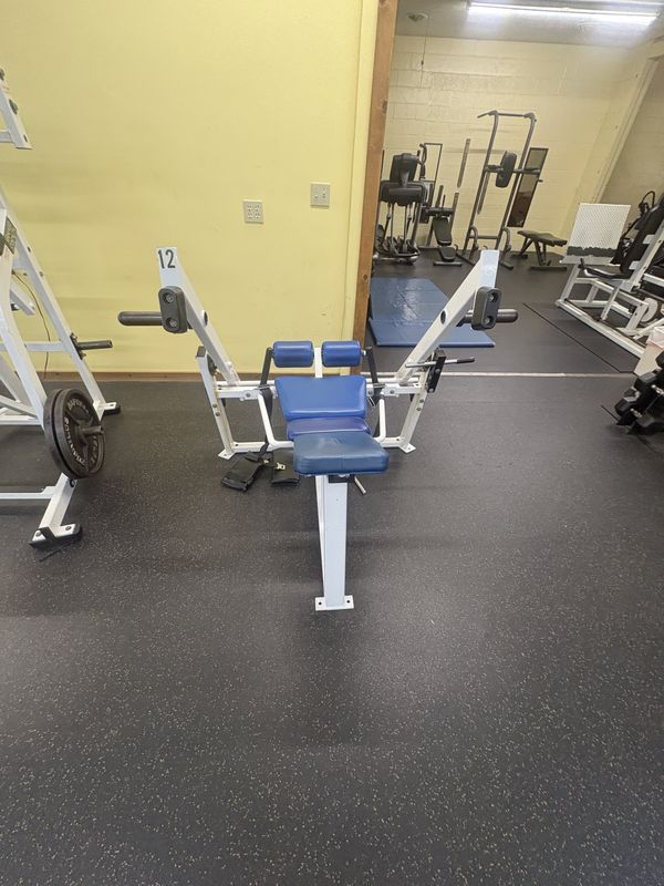 Strength machines facing the mirrored wall